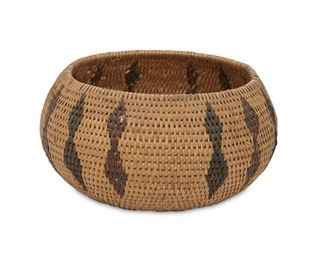 132
A Tulare Polychrome Basket
First-half 20th Century
Woven with polychrome geometric band
2.75" H x 5.5" Dia.
Estimate: $300 - $500