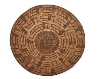 136
A Tohono O'odham (Pima) Basketry Bowl
First-quarter 20th Century
With stepped geometric design
5.25" H x 17.5" Dia.
Estimate: $600 - $800