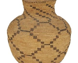 138
A Large Papago Basketry Olla
First-quarter 20th Century
With an all over lattice motif
11.5" H x 11" Dia.
Estimate: $500 - $700