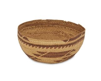 145
A Hupa Basketry Hat
First-quarter 20th Century <br />
Woven with polychrome geometric designs on a natural ground
3" H x 7" Dia.
Estimate: $400 - $600