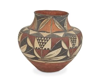 152
A Laguna Pueblo Polychrome Pottery Olla
First-quarter 20th Century
Stylized floral motif in red, orange, black, and cream
9.25" H x 10" Dia.
Estimate: $1,200 - $1,800