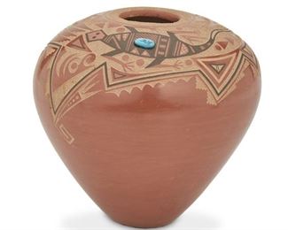 158
A Glendora Fragua Jemez Pueblo Pottery Vase
(b. 1958, Jemez Pueblo)
Signed with cornstalk
The pottery vessel with sgraffito on highly-polished clay with lizard motif and applied turquoise
4" H x 4.25" W
Estimate: $200 - $300
