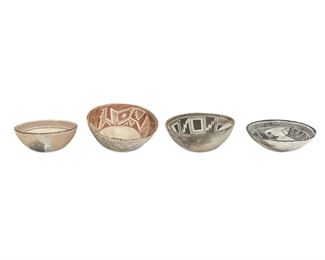 166
Four Mimbres-Style Bowls
Pre-Historic or later
One signed: S. Black
Comprising three Mimbres-style bowls, one with rabbit interior, one black on white with coatimundi interior, and one red on white with geometric motif to interior, and one black on white Anasazi-style bowl geometric interior motif, 4 pieces
Largest: 5.5" H x 11" Dia.
Estimate: $400 - $600