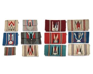 169
A Group Of Chimayo Handwoven Clutch Purses
Mid-20th Century
Various makers including: Ganscraft, La Azteca, El Grandee
Ten clutch purses and three zippered pouches sewn from New Mexico Chimayo wool weavings, in varying colors, some with silver snaps, interior zippers, and interior buttons, 13 pieces
Largest approximately: 6" H x 9.75" W
Estimate: $500 - $700