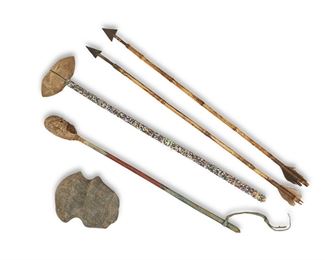 173
A Collection Of Native American Objects
First-half 20th Century
Comprising two reed/cane shafted arrows with detachable points, one polychrome drum stick, one ceremonial beaded Crow axe, and one partial axe head, 5 pieces
Largest; 22.75" L
Estimate: $300 - $500