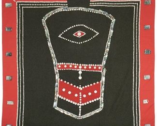 174
A Kwakiutl Button Blanket
First-half 20th Century
Abalone and mother-of-pearl buttons on green felt foundation with red cotton borders, a central design of a Northwest Coast copper to center
60.5" L x 62" W
Estimate: $1,000 - $1,500