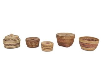 178
Five Northwest Coast Polychrome Baskets
First-half 20th Century
Makers include Tlingit and Makah, comprising woven vessels with various polychrome geometric patterns consisting of four lidded baskets and one bowl, 5 pieces
Largest: 4" H x 6.75" Dia.
Estimate: $500 - $700