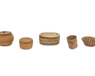 179
A Group Of Five Miniature Baskets
First-quarter 20th Century
Comprising three Northwest Coast lidded baskets and one cylindrical basket, and one Pima bowl, various geometric designs, 5 pieces
Larger: 1.75" H x 4.25" W x 3.25" D; Smaller: 2.25" H x 1.75" Dia.
Estimate: $600 - $800
