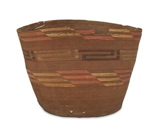 180
A Large Tlingit Storage Basket
First-quarter 20th Century
With imbricated polychrome bands in yellow, blue, pink, and dark purple
9.75" H x 13" Dia.
Estimate: $200 - $300