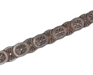 188
A Navajo Sandcast Concho Belt
First-quarter 20th Century
Designed with five butterflies, six conchos, and a buckle on an a leather belt
41.5" L; Each concho: 3" H x 3.625" W
939 grams
Estimate: $800 - $1,200