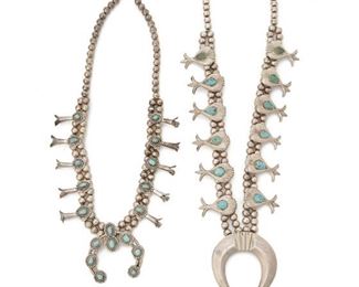 213
Two Southwest Turquoise-Set Squash Blossom Necklaces
Mid-20th Century
Comprising two necklaces each set with turquoise, 2 pieces
Larger necklace: 24" L x 2.75" H
412 grams
Estimate: $800 - $1,200