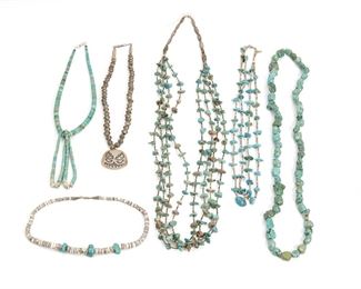 220
A Group Of Native American Turquoise Jewelry
One stamped: CL
Comprising two multi-strand heishe and turquoise necklaces, a single strand heshi and turquoise bead necklace, a tumbled turquoise bead neckalce, a turquoise and heshi jacala necklace, and a silver bead pendant necklace
Longest necklace: 40"
6 pieces
Estimate: $500 - $700