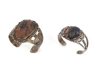 230
Two Southwest Jasper Set Cuff Bracelets
Both set with jasper and stamped entirely
Largest 7" x 2.30" H
130 grams
2 pieces
Estimate: $500 - $700