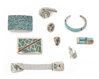 237
A Group Of Southwest Turquoise Jewelry
Mid-20th Century
Including: a watch band with chip inlay (Thomas Singer), a channel inlay cuff, a Navajo bear, two chip inlay belt buckles, two chip inlay rings (Juan Singer), a inlay money clip, a howling wolf brooch/pendant, 9 pieces
Largest belt: 3" L x 2" W
248 grams
Estimate: $400 - $600