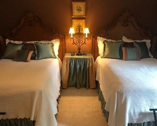 Pair of full beds, custom bedding. Beds are adjustable to queen - set up as full 