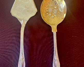#1087A - Silver plate cake server and gold wash bowl serving spoon - $14