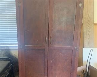 #2186W. Wooden storage cabinet with contents $50