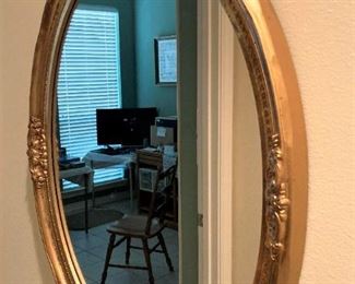 Gold toned mirror