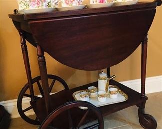Closeup of Vintage Mahogany Drop Leaf Tea Cart with Removable Glass Serving Tray