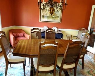 Dining Room Table,  8 chairs , 2 leaves, pads 