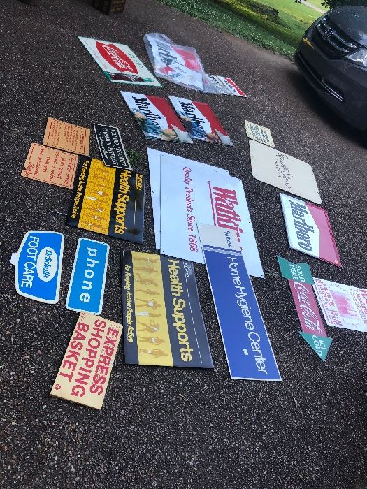 Tons of advertising signs. All are old and most are metal