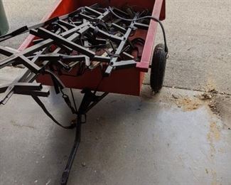 Garden cart, loaded with tree stand ladder sections