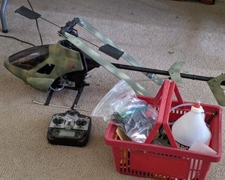RC Glow Fuel Helicopter with JR XP6102 remote and basket of accessories, including starter, chargers and balancers.  Also has training rig to prevent damage to blades while learning to fly.  Asking $400