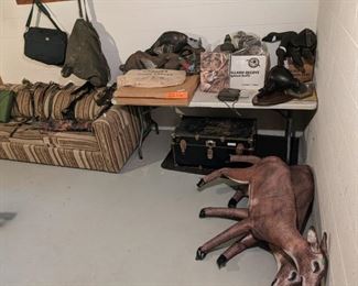 Basement - 2 inflatable deer decoys $10 each, duck decoys (box of 6) $20, turkey decoys $5 each, Antique goose decoys Asking $80, Goose decoys (set of 4 ) $20. Also some gear bags, a foot locker, and a sofa.