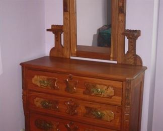 ANTIQUE DRESSER WITH CANDLE HOLDERS