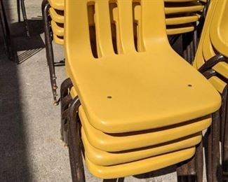 (4) Stackable Mustard Yellow Chairs
