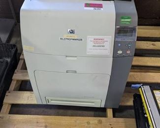 HP Color LaserJet 4700dn Printer with extra cartridges