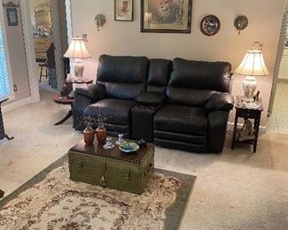 Less than a year old leather catnapper sofa recliner