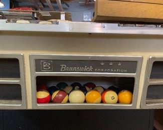  Brunswick pool table with cues and balls 
