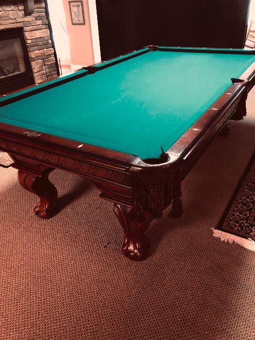American Heritage Billard Table (and Ping Pong Table); color is more green than picture shows...has diamond shaped mother of pearl inlays on border, leather pockets