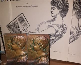 Cast iron "News Years" book ends