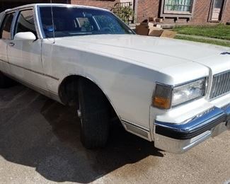 CORRECTION  V-8 not V-6!! Chevrolet Impala 4 door V-6, approx. 130000 miles one owner, burgundy leather interior. Silent bid auction Friday and Saturday through 12:00 noon, then all bids opened, high bidder wins. No reserve!!