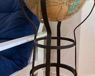Lovely globe and wrought iron stand