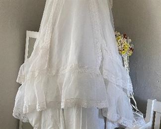 Beautiful vintage 1970s wooden gown, veil train and bouquet
