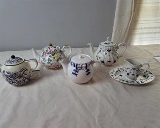 4 Teapots and Creamer