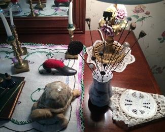 Antique hat pins and pin cushion