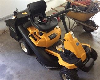 Cub Cadet Riding Mower. This unit has been used a total of 4 hours! Like brand new!