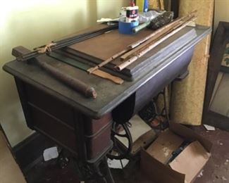 There are two antique sewing machines.  Family is keeping one,  not sure which one yet. 