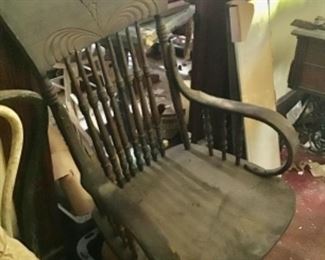 Antique Chair.  They said the bottom is there somewhere.  