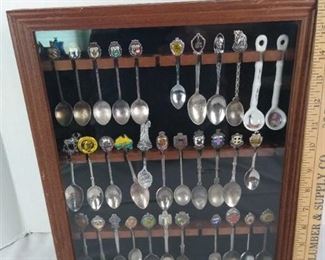 Wooden display with miniature spoons