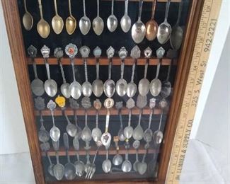 Wooden display with miniature spoons