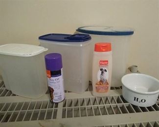 3 plastic containers and dog supplies