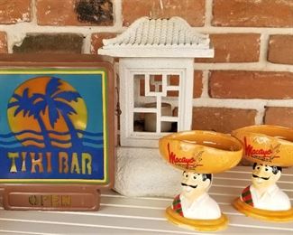 Tiki Bar sign and ceramic Mexican cups with white lantern.