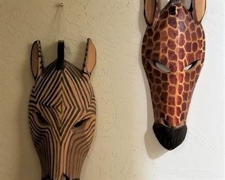 Zebra mask and giraffe mask.