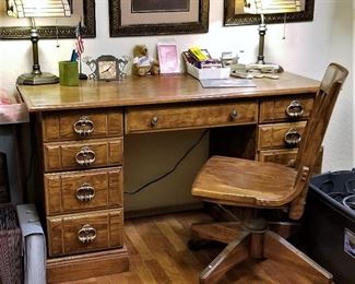 Wonderful office desk just the right size. Not too big and not too small. Vintage swivel office chair.