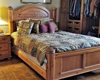 Knotty pine queen bed and mattress along with matching nightstand table, dresser and armoire. Pillows and comforters also for sale.